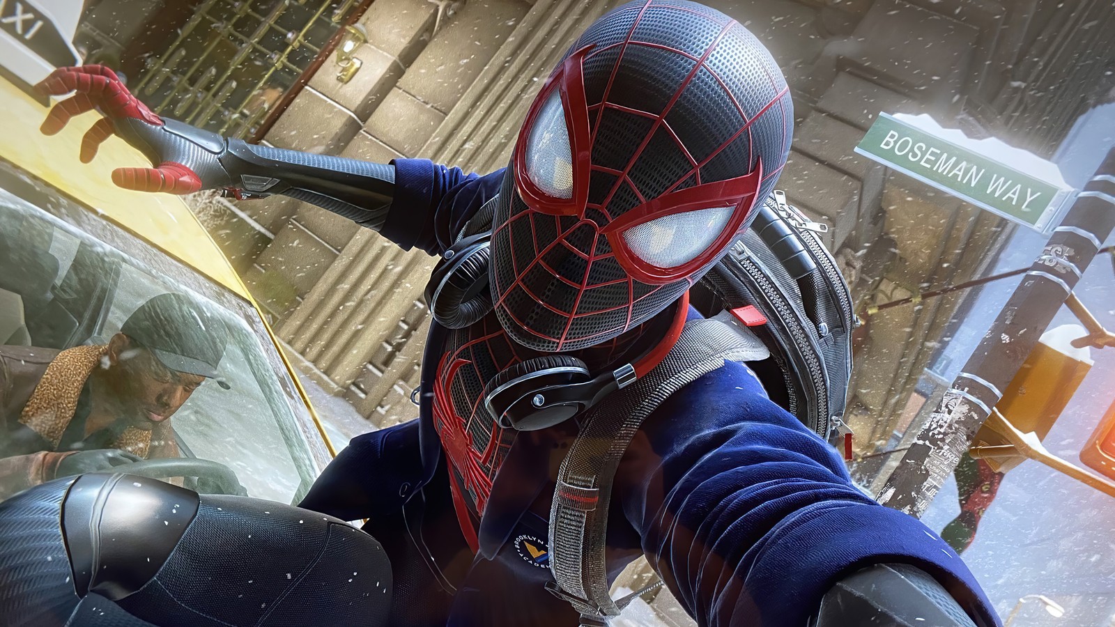 Spider-man dans un costume bleu se tenant dans la neige (marvels spider man miles morales, playstation 5, ps5, jeu vidéo, miles morales)