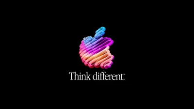 Logo colorido de Apple con el eslogan 'Piensa diferente' sobre fondo negro