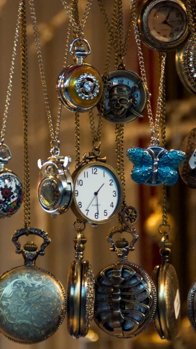 Vintage pocket watches and decorative pendants hanging elegantly.