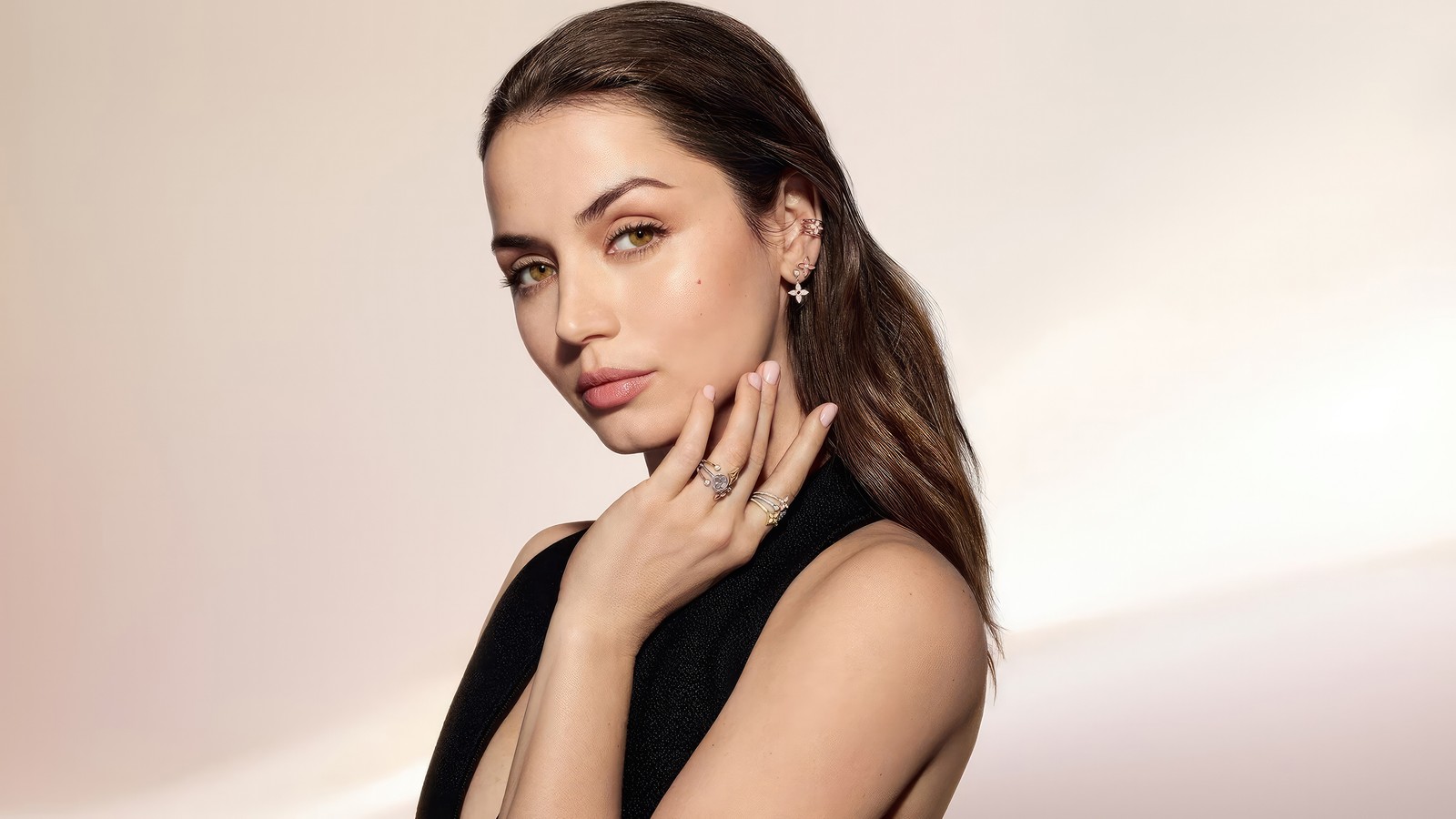 A woman in a black dress posing for a picture (ana de armas, 2023, people, 4k wallpaper)