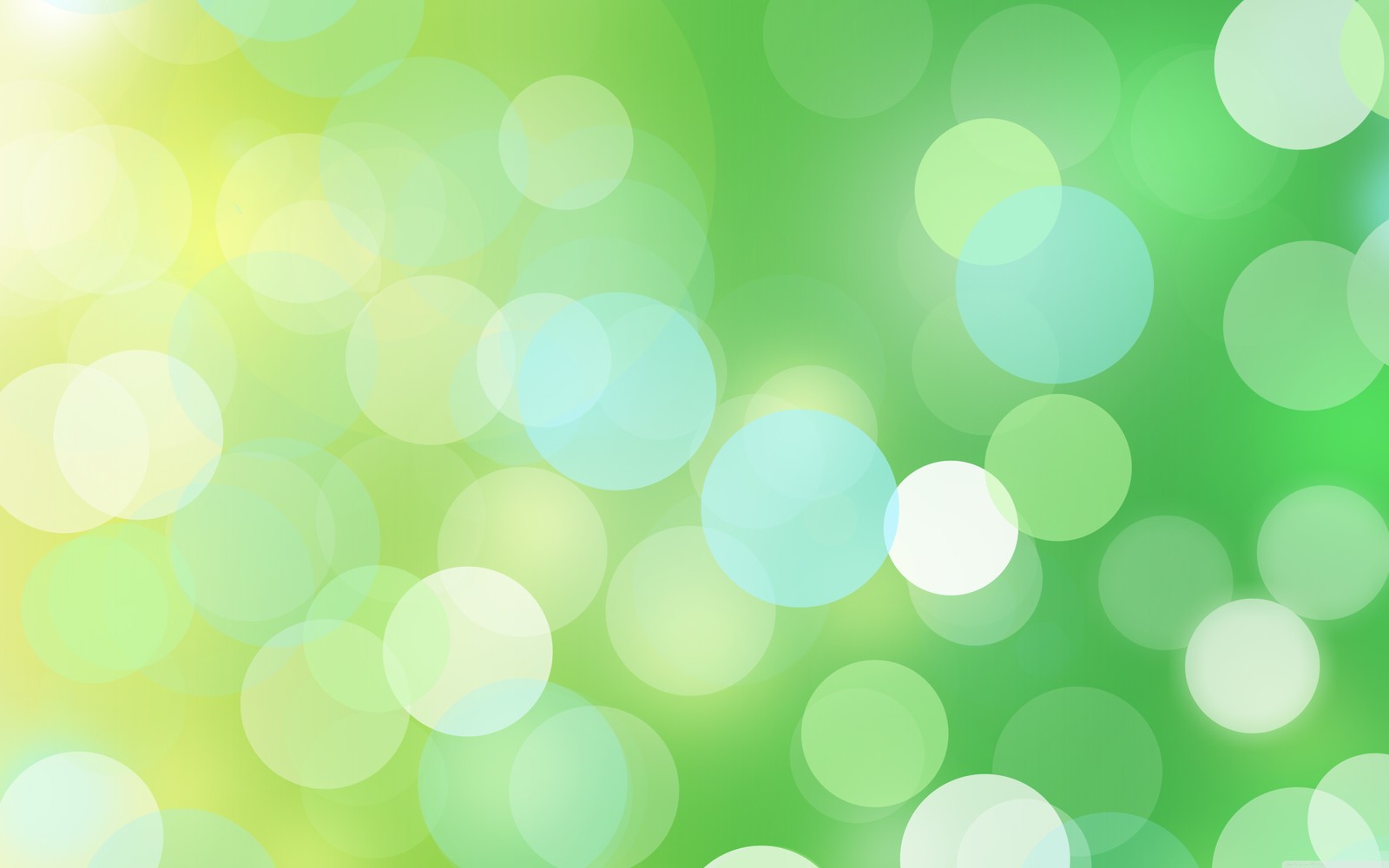 A close up of a green and white background with circles (green, pattern, yellow, circle, sunlight)