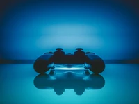 Manette de jeu illuminée dans un reflet bleu électrique