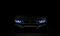 BMW M Series with Striking Blue Headlamps Against a Dark Background