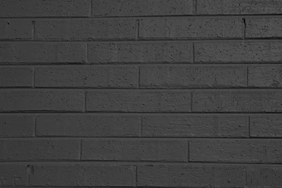 Monochrome Textured Black Brick Wall