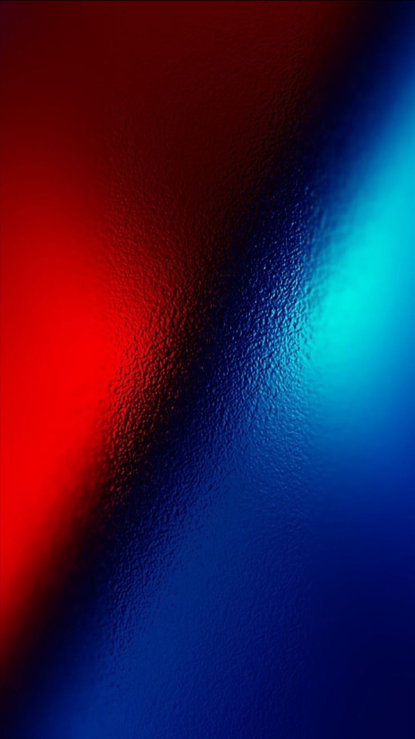 A close up of a red and blue background with a blurry effect (blue, blur, designs, red, texture)