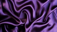 Luxurious Violet Satin Fabric: Close-Up of Silk Textile Elegance