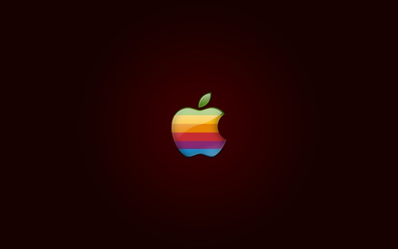 Крупный план логотипа apple на темном фоне (яблоко, логотип, оранжевый, фрукт, растение)