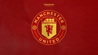 Logo de Manchester United sobre fondo rojo - Fondo de pantalla deportivo 5K