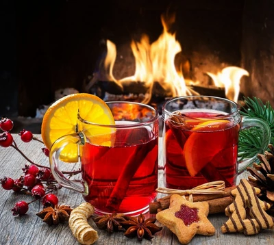 Bebidas y delicias navideñas acogedoras junto a la chimenea