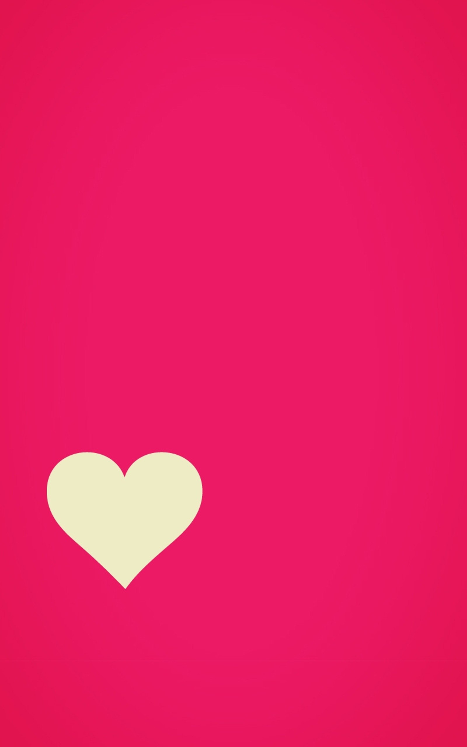 A close up of a heart on a pink background (heart, love, pink)