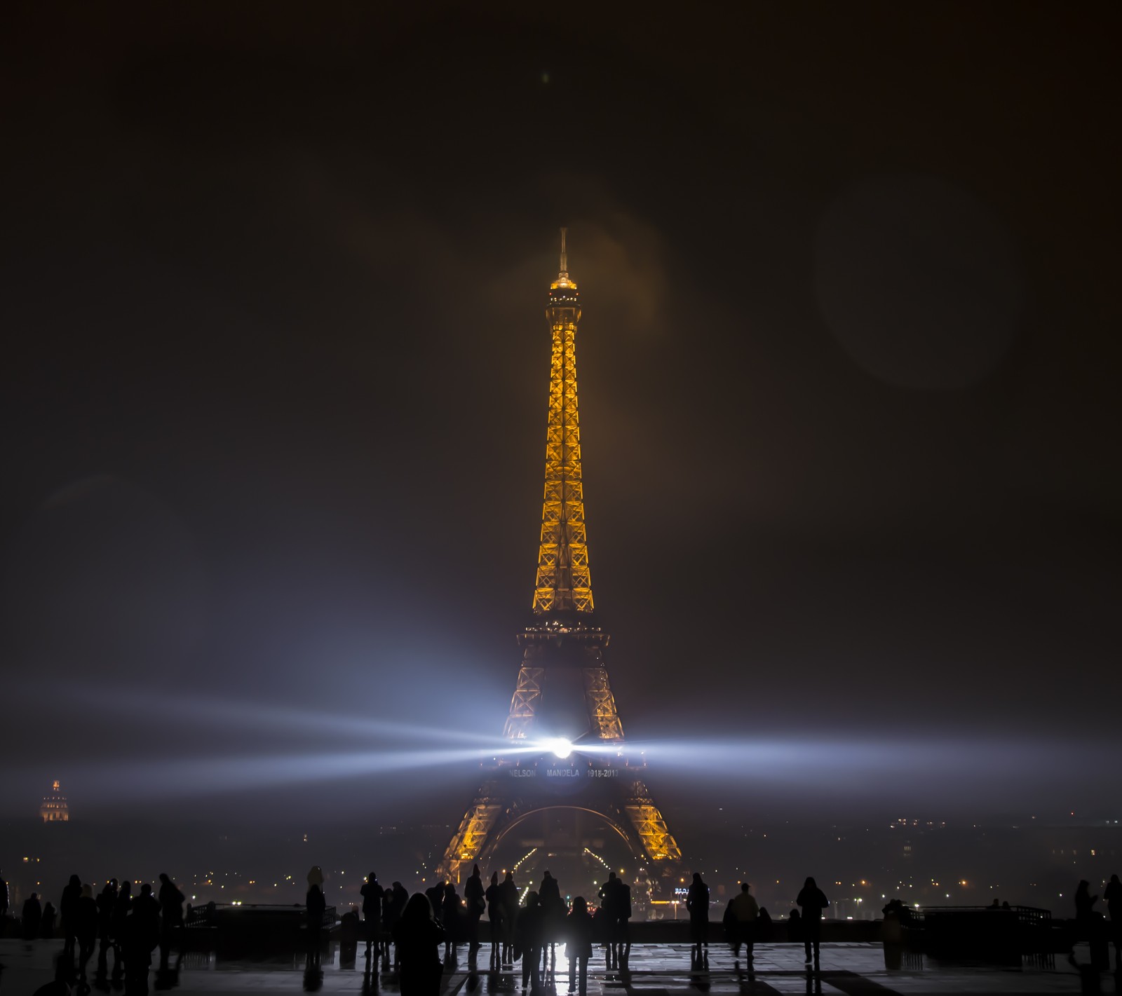 People standing in front of the eiffel tower at night (eiffel, paris, tower)