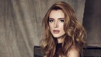 Bella Thorne: Captivating Portrait of a Red-Haired Actress