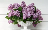 Elegant Purple Lilac Bouquet in a Decorative Vase