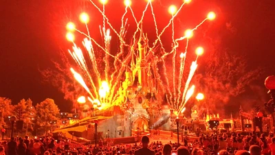 Fireworks Illuminate Disneyland Castle During New Year's Eve Celebration