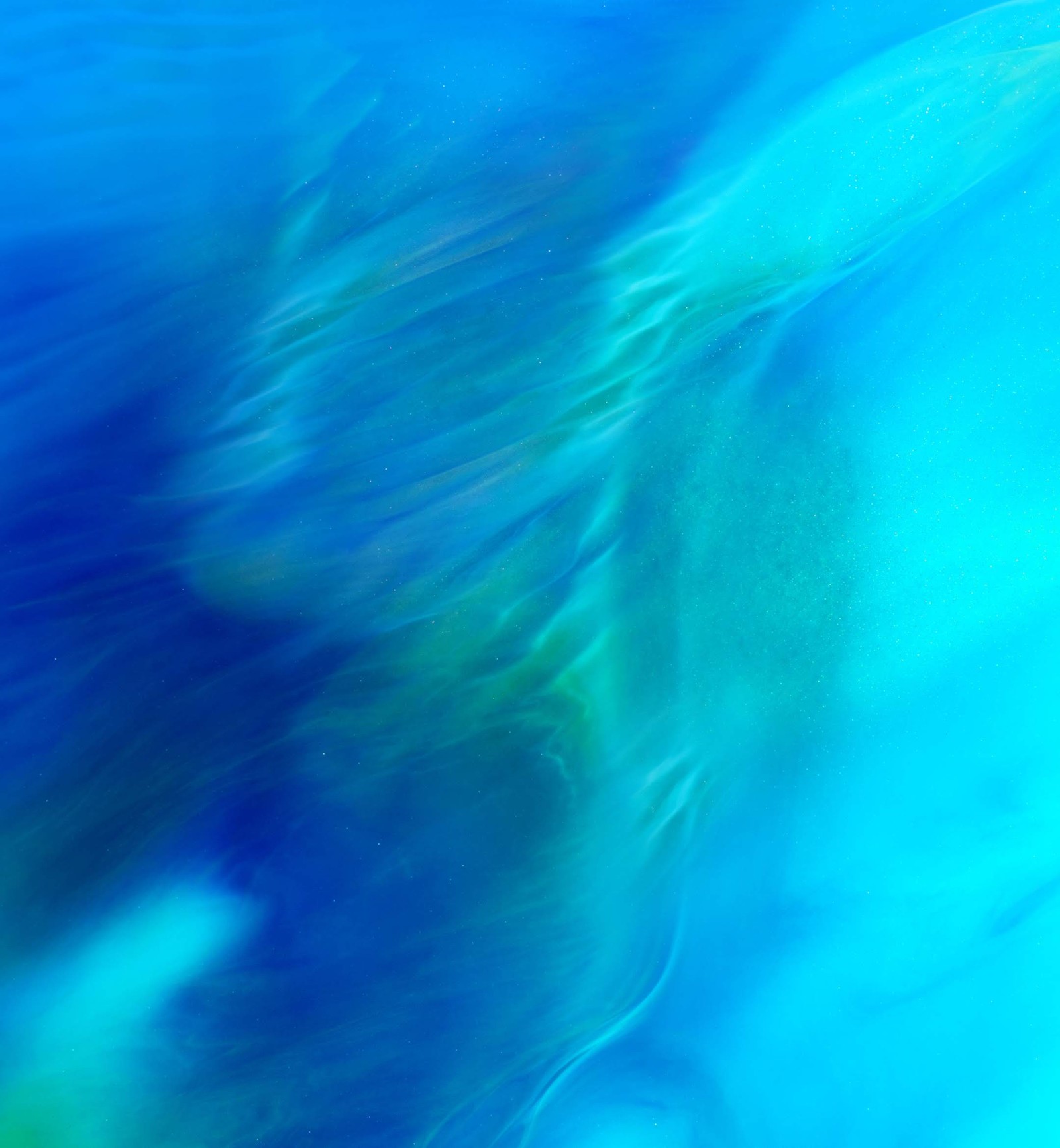 Blurry image of a surfer riding a wave in the ocean (huawei, honor magic 2, smartphone, fluid, blue)