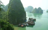 Serene Bay with Lush Hills and Rustic Boats