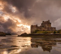 Eilean Donan Castle at Dawn: A Majestic Scottish Landmark Amidst Dramatic Skies