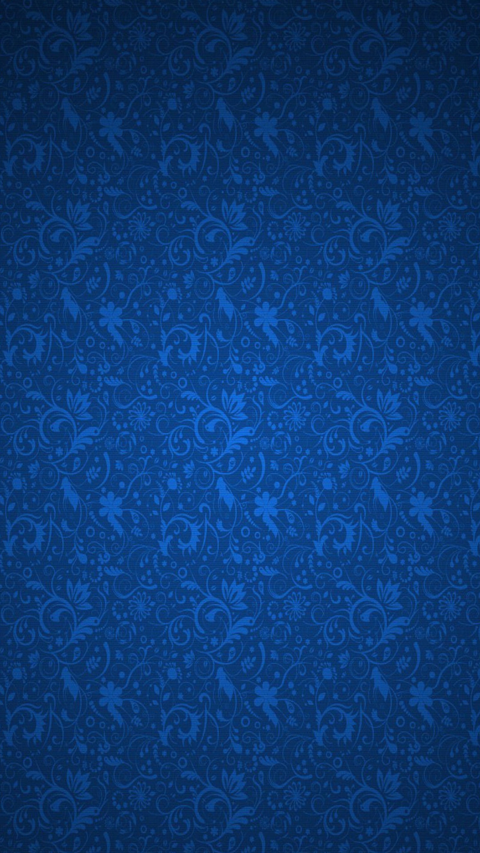 A blue floral background with a dark blue background (blue, pattern)