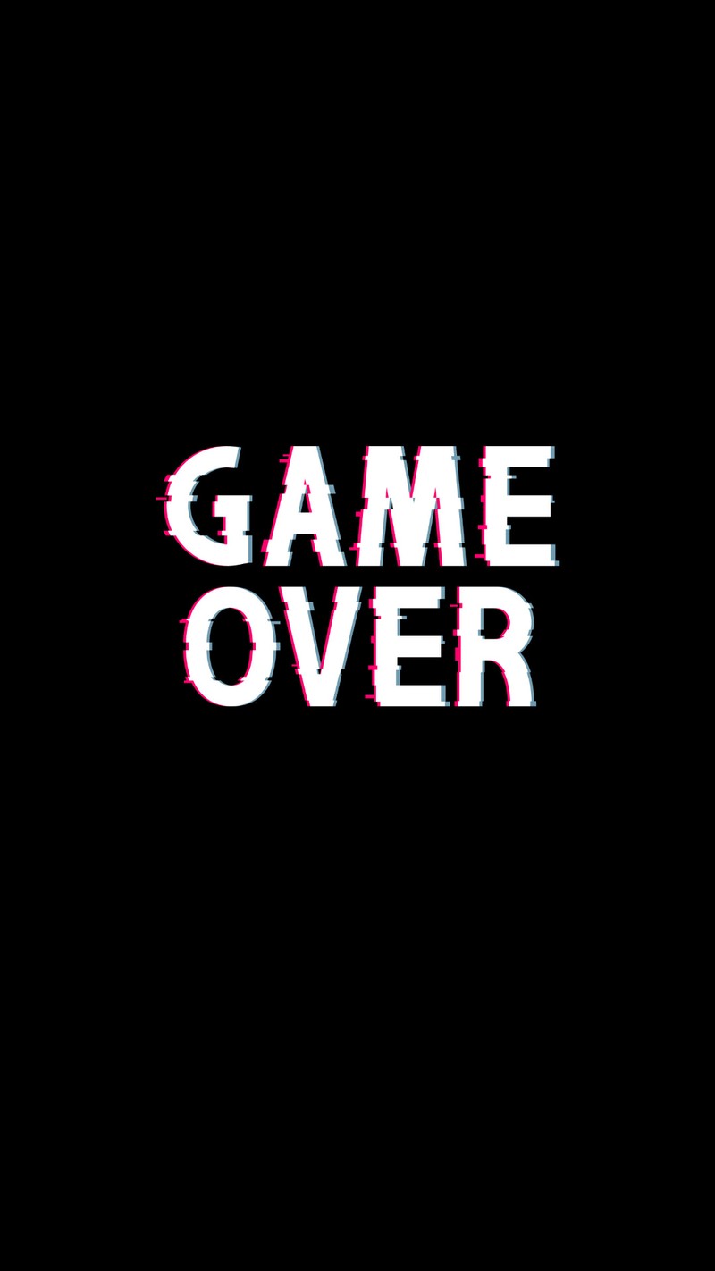 Близкий план черного фона с текстом 'game over' (искусство, чёрный, игра, игры, сбой)