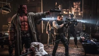 Hellboy and Ben Daimio confront armed foes in a tense showdown from Hellboy (2019).