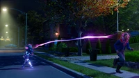 An alien character uses a beam to chase a human in a suburban nighttime setting, capturing the essence of chaos in a video game scenario.