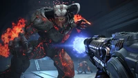 Confrontación intensa con un monstruo ardiente en Doom Eternal