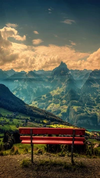 Vista serena da montanha com um banco vibrante sob um céu nublado