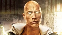 Dwayne Johnson as Black Adam, featuring a fierce expression and glowing eyes, set against a dramatic backdrop with artistic lighting effects.