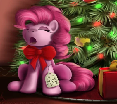 Poney rose festif sous le sapin de Noël