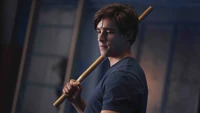 Dick Grayson with a staff in Titans Season 2.