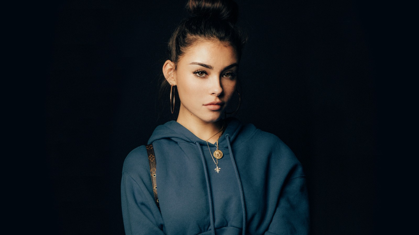 A woman in a blue hoodie posing for a picture (madison beer, singer, celebrity, women, girls)