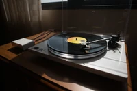 Modern Turntable Playing a Vinyl Record