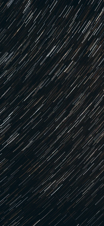 Dynamic Patterns of Star Trails Against a Dark Atmosphere