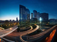 Dynamic Paris Skyline at Dusk: A Fusion of Urban Architecture and Vibrant City Life