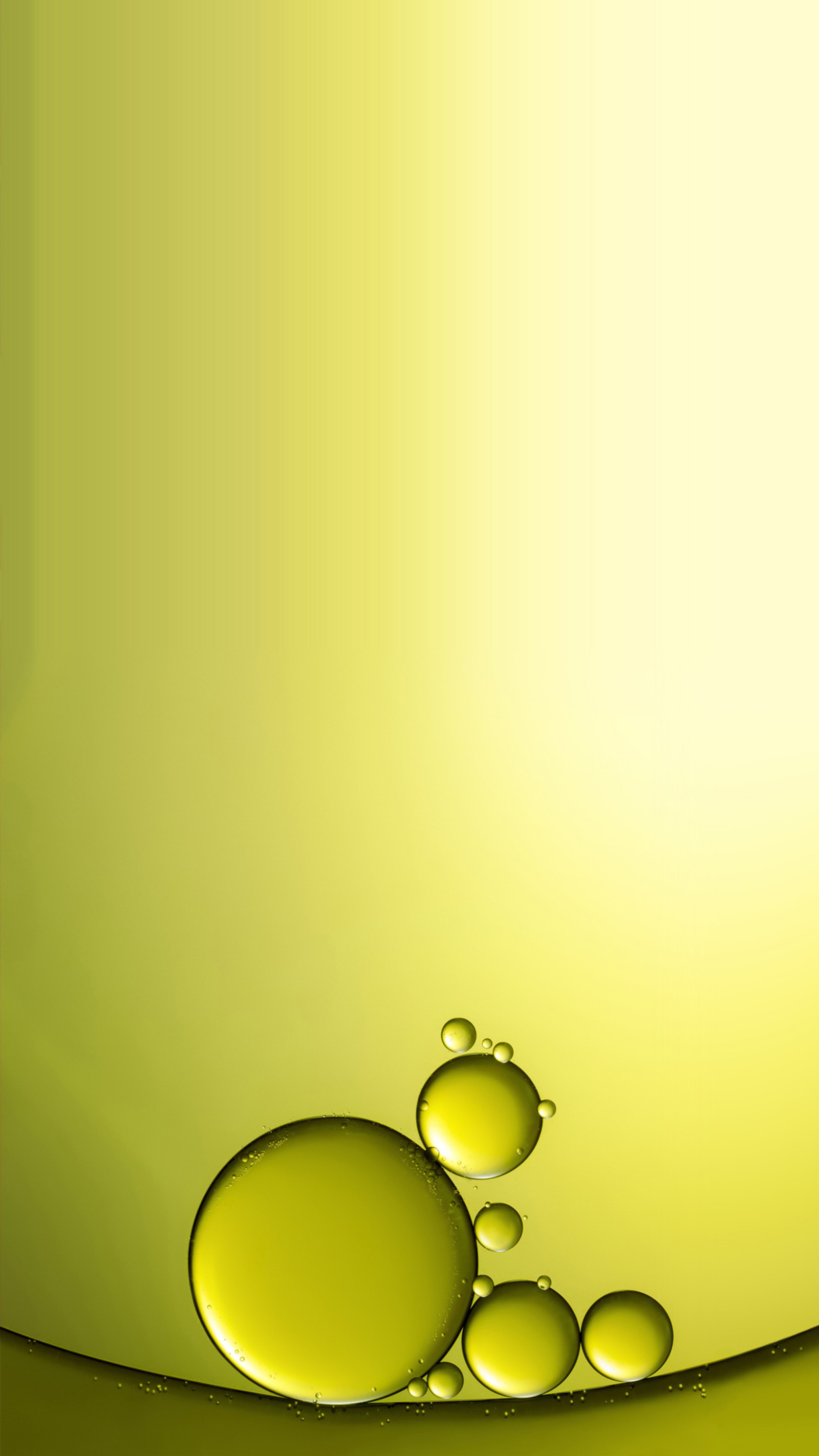 A close up of a yellow background with a lot of water droplets (circle, yellow)