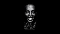 Ronaldinho: Iconic Brazilian Football Star on a Black Background