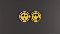 Playful Yellow Emoticons: Surprise and Love