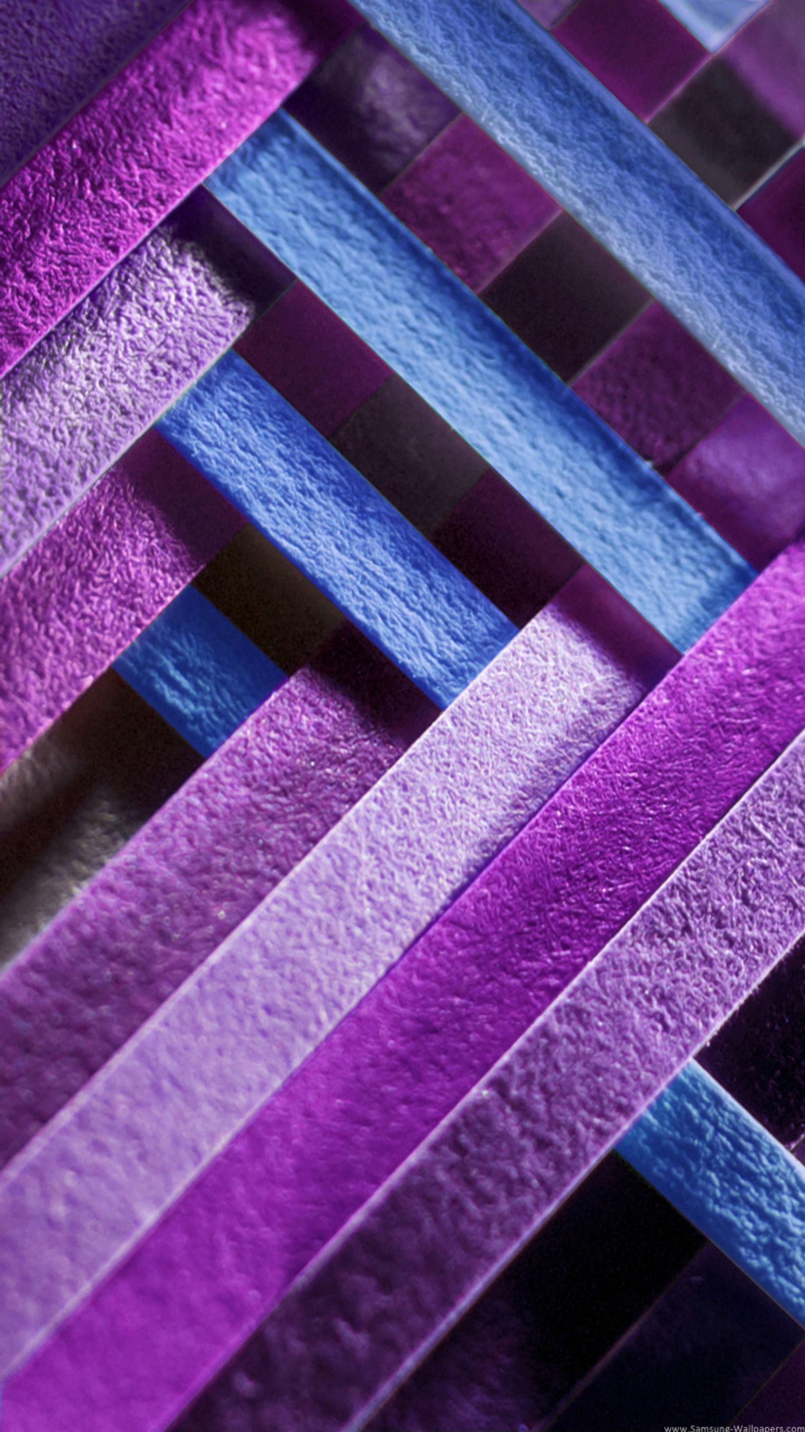 Purple and blue strips of paper are arranged in a pattern (2016, awesome, love)