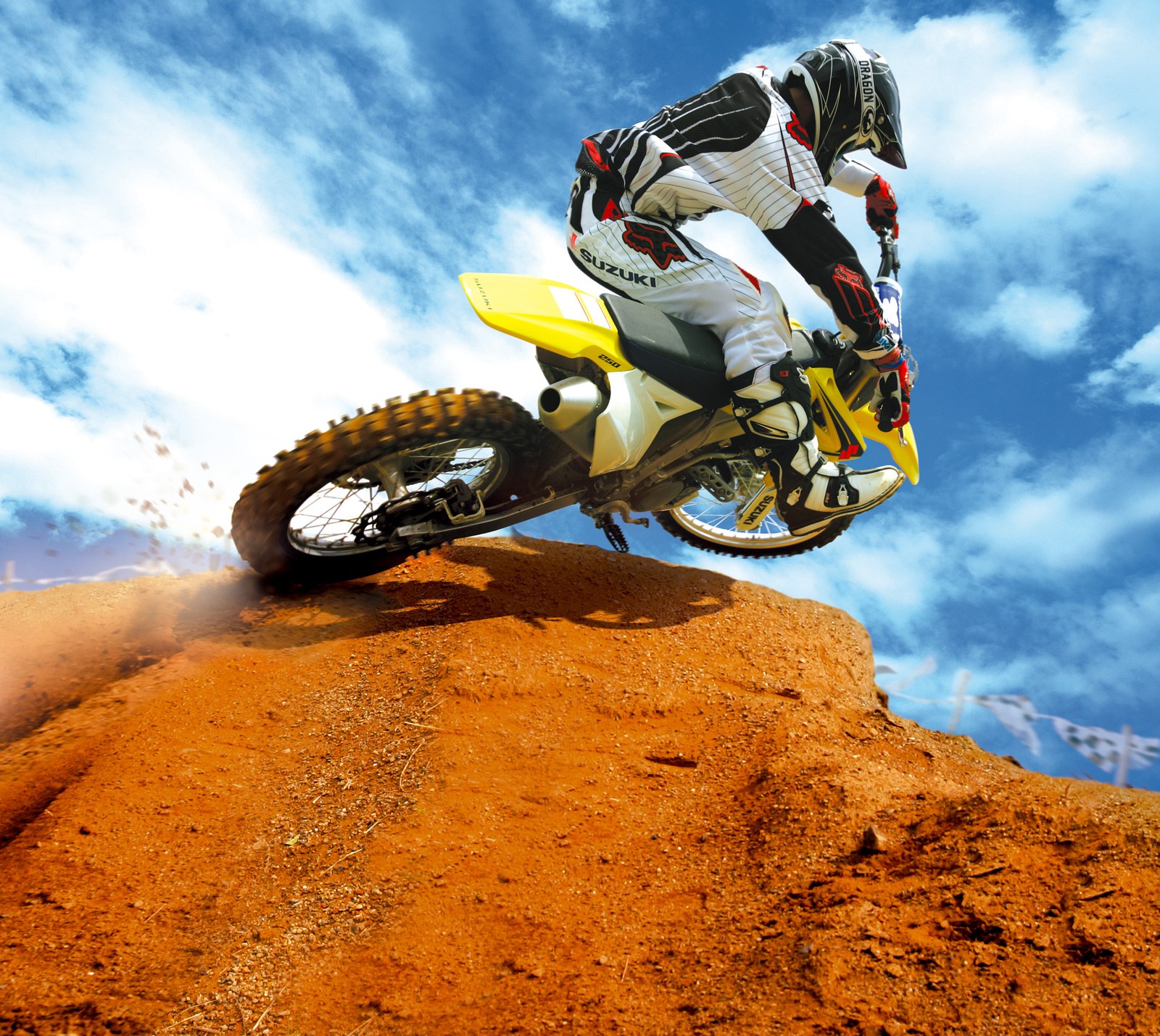 Arafed motorcyclist riding on a dirt bike on a hill (moto, motocross, race)