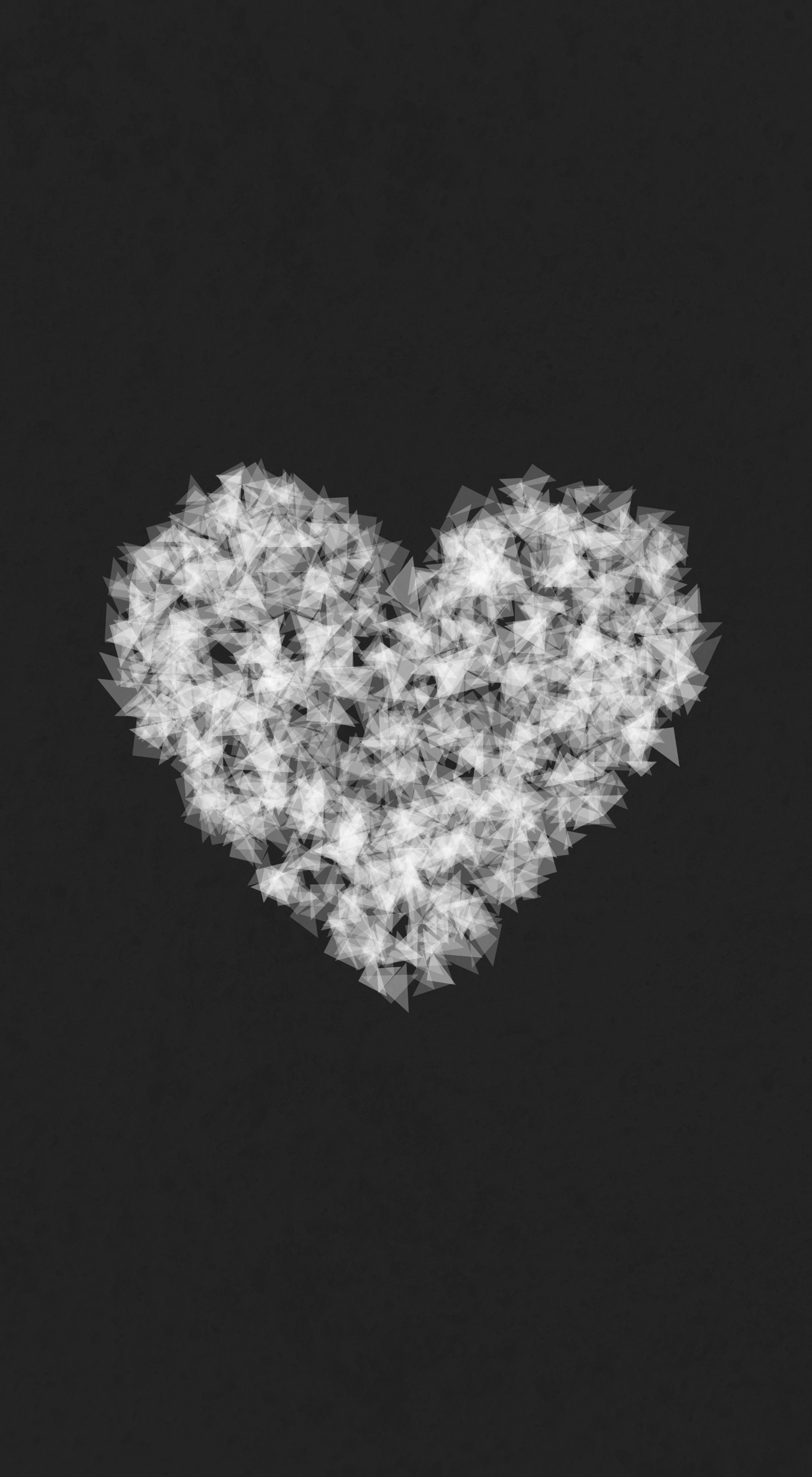 A black and white photo of a heart made of white feathers (broken, dark, glass, heart, heartbreak)