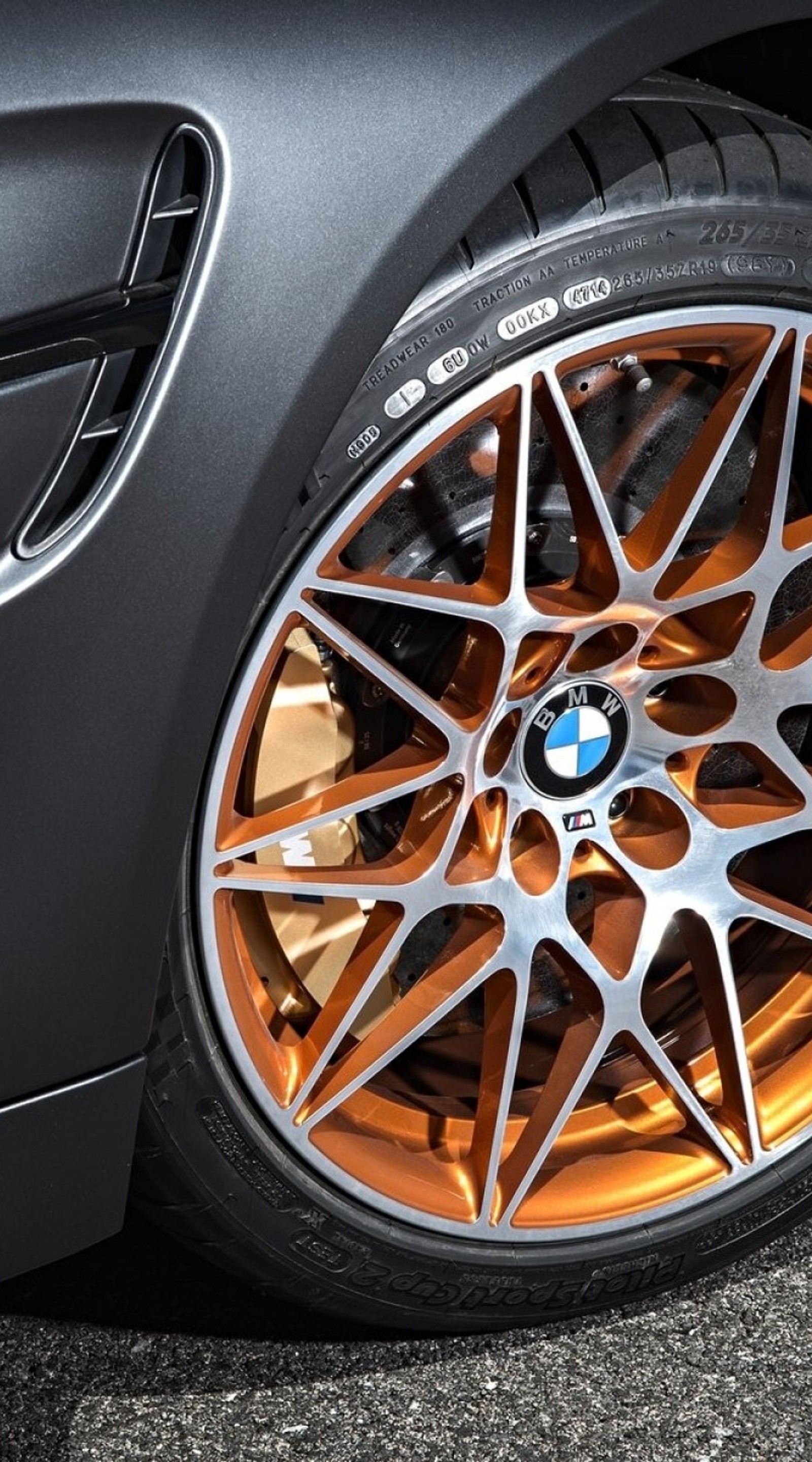 A close up of a car with a shiny rim and orange rim (bmw, bmw m4 gts, car, sports car)