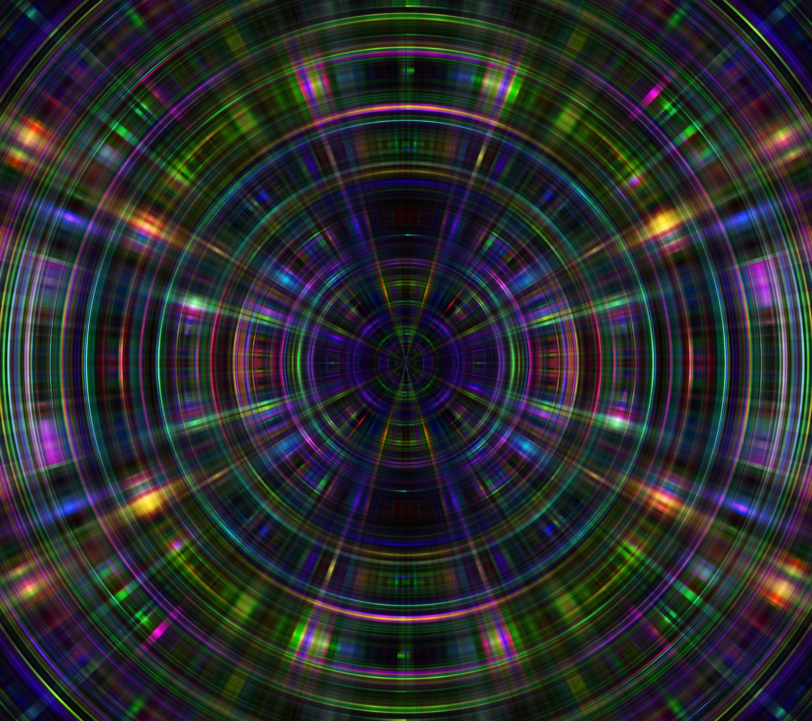 A circular image of a colorful light in a dark room (abstract, circle, spiral)