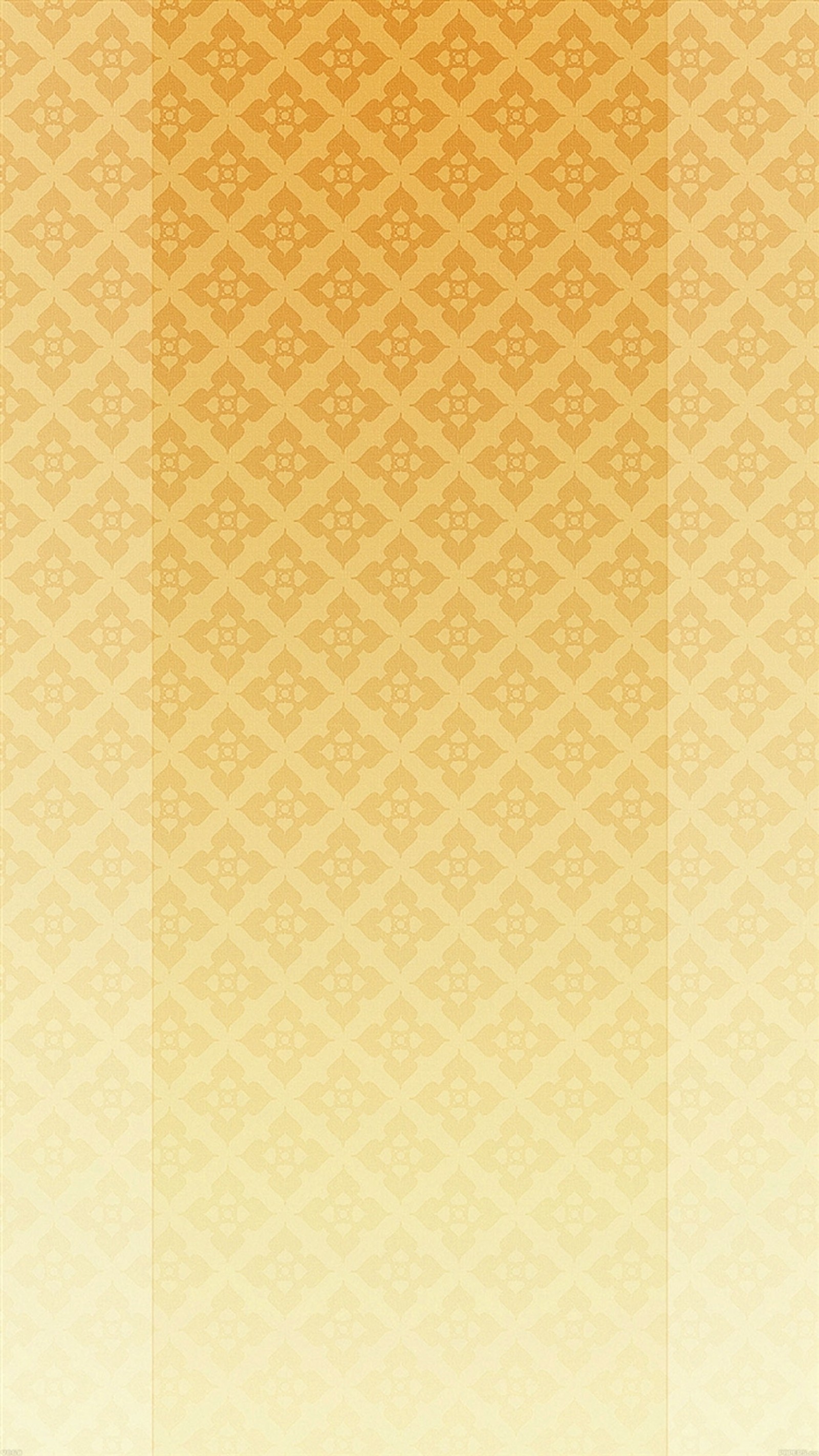 Un gros plan d'un fond jaune et orange avec un motif (sombre, or, motif, texture)