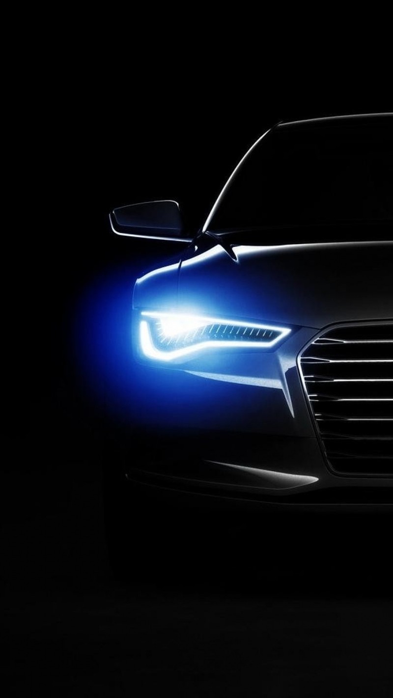 The front of a black audi car with a bright light on it (cars, cool)