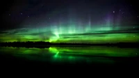 Enchanting Aurora Reflections Under a Starry Night Sky