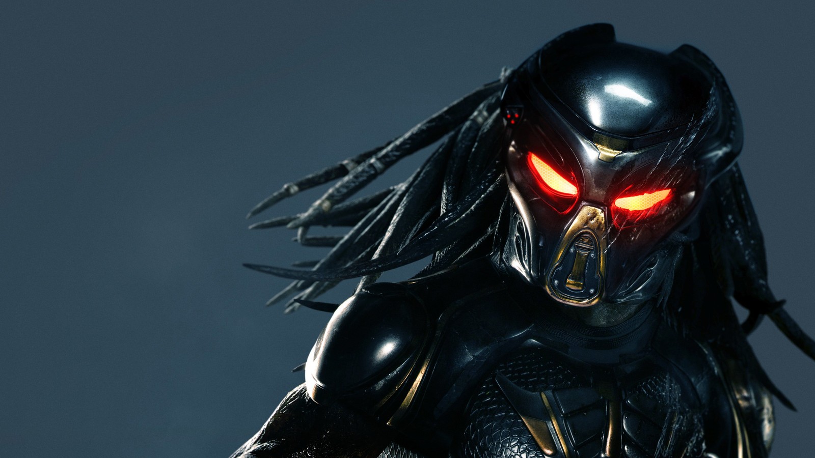 A close up of a predator with red eyes and a black suit (predator, alien, helmet, action figure, supervillain)