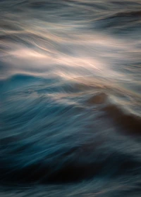 Calm Ocean Waves Under Soft Light