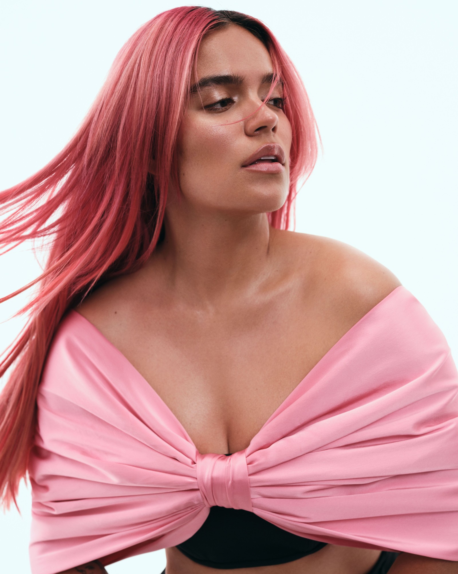 Arafed woman with pink hair and a black bra top (karol g, portrait, 5k, colombian singer, people)