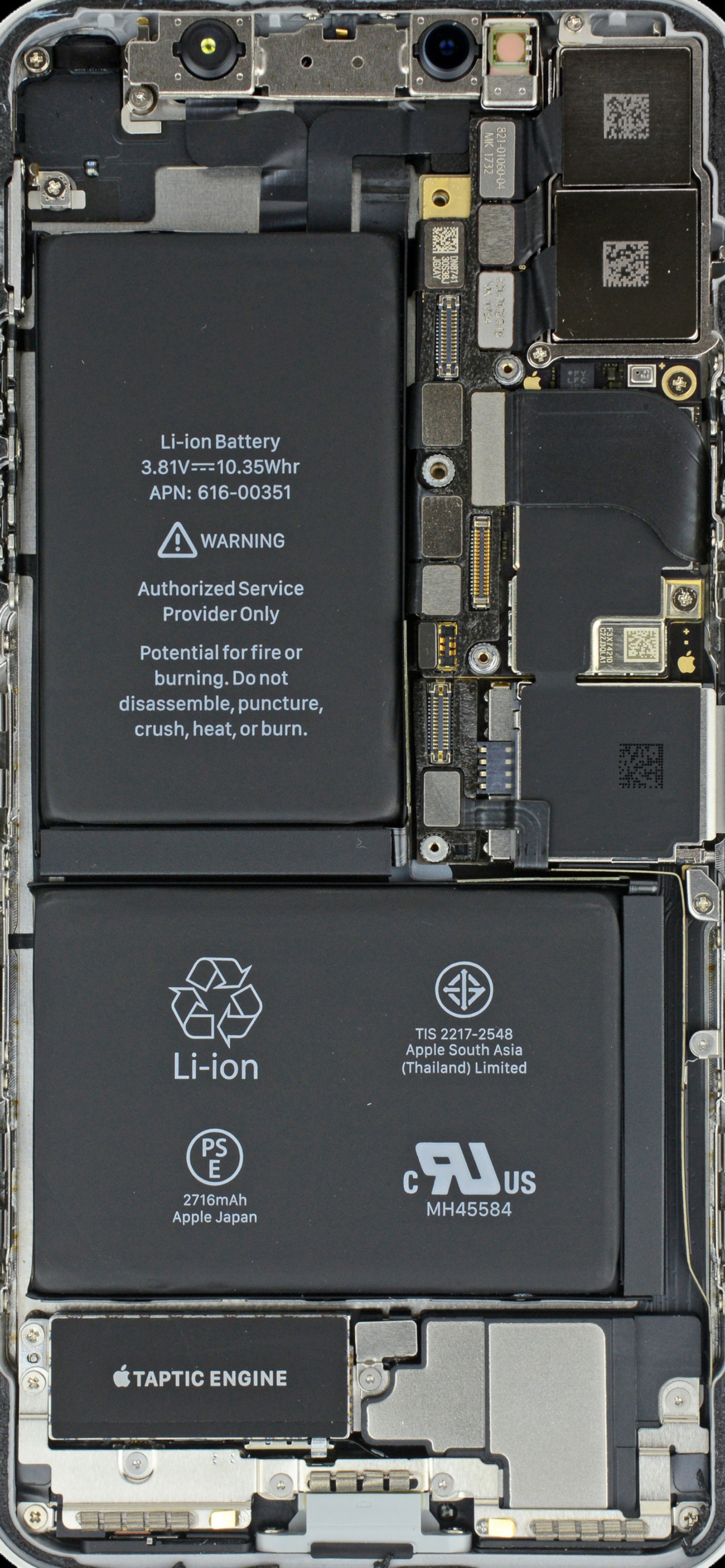 A close up of a cell phone with a battery attached to it (amazing, cool, electronics, insides, iphone x)