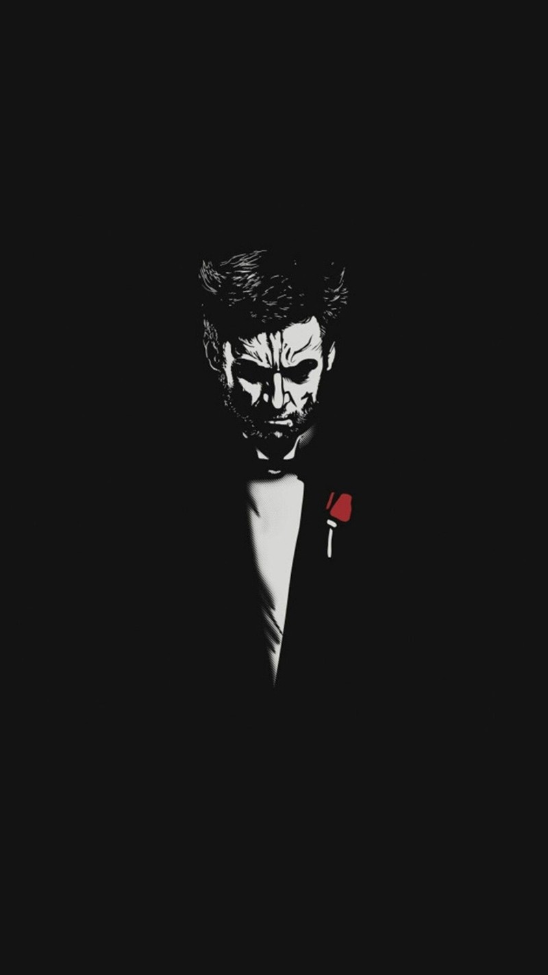 Крупный план человека в костюме с красной розой (wolverine, крестный отец, godfather)